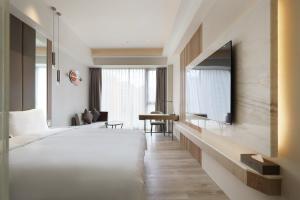 Katil atau katil-katil dalam bilik di Gamalan Star Hotel