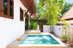 Fotografie z fotogalerie ubytování Thai Style 2BR Villa v destinaci Nai Harn pláž