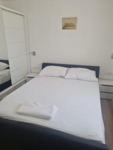 Posteľ alebo postele v izbe v ubytovaní Apartmani Jukic 3 + 37 fotografií