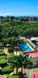 an aerial view of a resort with a swimming pool at Natal Verano Ponta Negra in Natal