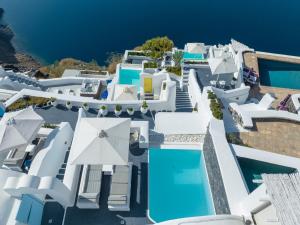 an aerial view of a villa with a swimming pool at Dreams Luxury Suites in Imerovigli