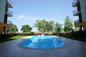 The swimming pool at or close to Viktória Beach Apartman Gold 1. Siófok