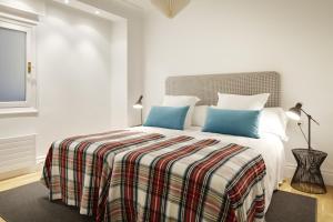 Krevet ili kreveti u jedinici u okviru objekta Playa de La Concha 4 by FeelFree Rentals