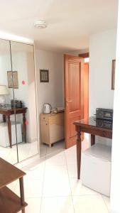 A kitchen or kitchenette at Chicco's Suite