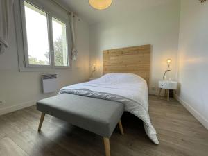 Postel nebo postele na pokoji v ubytování Maison Saint-Denis-d'Oléron, 3 pièces, 6 personnes - FR-1-246A-186