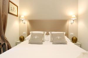 Letto o letti in una camera di Daplace - Arena House