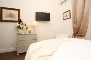 Letto o letti in una camera di Daplace - Arena House