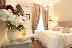 Letto o letti in una camera di Daplace - Arena House