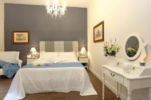 Letto o letti in una camera di Daplace - Arena House