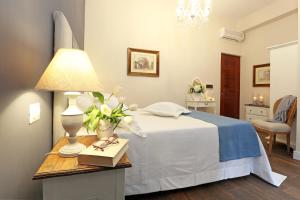 Letto o letti in una camera di Daplace - Arena House