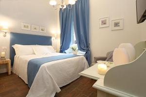 Letto o letti in una camera di Daplace - Arena House