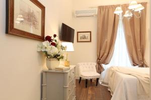 Letto o letti in una camera di Daplace - Arena House