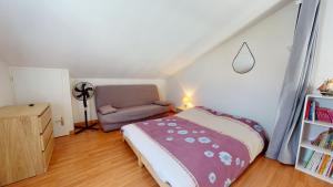 Łóżko lub łóżka w pokoju w obiekcie Le Repos de la Mer 900 m plage