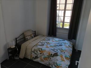 Posteľ alebo postele v izbe v ubytovaní O'Couvent - Appartement 87 m2 - 4 chambres - A501