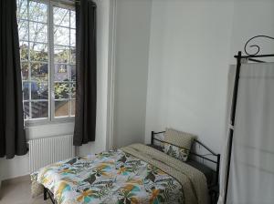 Posteľ alebo postele v izbe v ubytovaní O'Couvent - Appartement 87 m2 - 4 chambres - A501