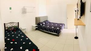 Fotografie z fotogalerie ubytování Homestay Lestary near Taiping Fast WIFI Netflix v destinaci Taiping