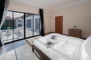 Fotografie z fotogalerie ubytování Majestic Residence Pattaya มาเจสติก พูลวิลล่าส์ 46 v destinaci Pattaya South + 10 fotografií