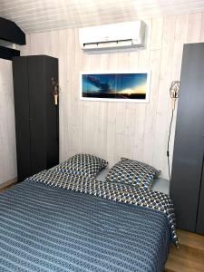 Postel nebo postele na pokoji v ubytování Le chalet du lac 40