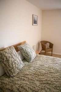 Posteľ alebo postele v izbe v ubytovaní Pechingorp Chambres d'hôtes