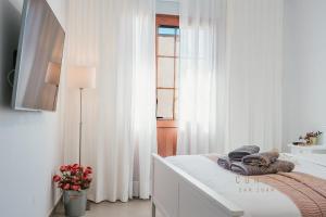 Vv CONDEVEGA客房内的一张或多张床位