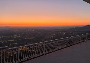 a view from the top of a building at sunset at Super panoramic new apartment in Casertavecchia in Caserta