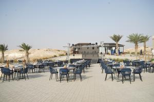 Restaurace v ubytování شاليهات سدرا لبيوت العطلات