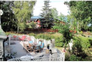 Billede fra billedgalleriet på Modern stuga med sjöutsikt i Hammarby