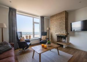 Кът за сядане в Appartement boulevard Vlissingen