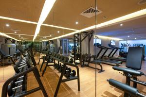 a gym with a lot of treadmills and machines at Barceló Anfa Casablanca in Casablanca