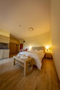 Postel nebo postele na pokoji v ubytování Apartmány Tatry