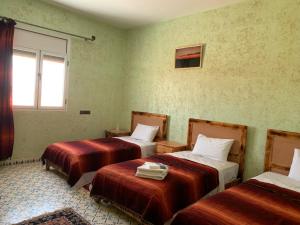 Postel nebo postele na pokoji v ubytování Birgits Bed & Bistro, Garage für Biker kostenlos