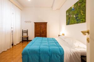 Postel nebo postele na pokoji v ubytování Casa Ibiscus