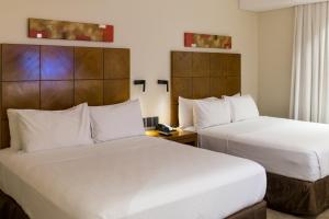 Кровать или кровати в номере Crowne Plaza Asunción by IHG