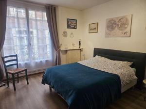 Posteľ alebo postele v izbe v ubytovaní l'Escale Dieppoise