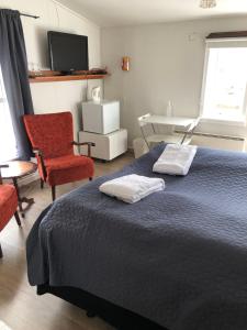 Letto o letti in una camera di Seljaland ferðaþjónusta