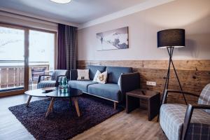 Posezení v ubytování Familienresort Ellmauhof - das echte All Inclusive