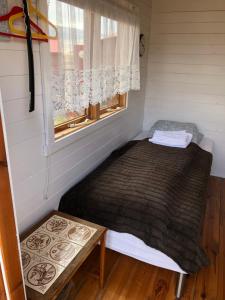 Letto o letti in una camera di Seljaland ferðaþjónusta