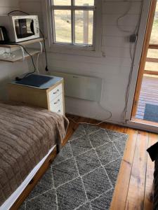 Letto o letti in una camera di Seljaland ferðaþjónusta