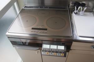 a close up of a kitchen appliance with a stove at Love Kyoto Kyoenkan in Kyoto