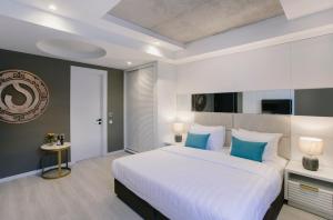 Postel nebo postele na pokoji v ubytování Original Boutique Hotel