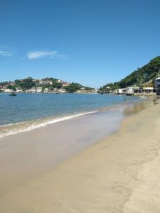 a view of the beach from the shoreline at Pousada Renascer in Mangaratiba