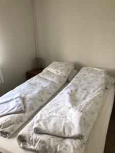 Letto o letti in una camera di Seljaland ferðaþjónusta