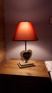 Postel nebo postele na pokoji v ubytování GITE Chambre SPA Privé DE L'ANCIENNE FERME