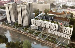 eine Luftansicht einer Stadt mit Gebäuden und einem Fluss in der Unterkunft River Deluxe Atal Towers Apartment in Breslau