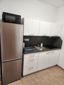 Kitchen o kitchenette sa Ubytování Janovice nad Úhlavou, Rozvojová zóna 186