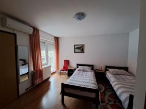 Posteľ alebo postele v izbe v ubytovaní Privatni smještaj Tolić