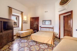 Postel nebo postele na pokoji v ubytování Hotel Primavera