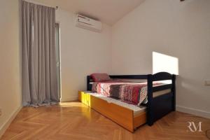 Postel nebo postele na pokoji v ubytování DS Apartment