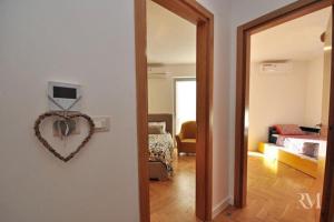 TV a/nebo společenská místnost v ubytování DS Apartment