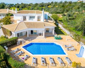 an aerial view of a villa with a swimming pool at Villa Rose Bay by Algarve Vacation in Albufeira